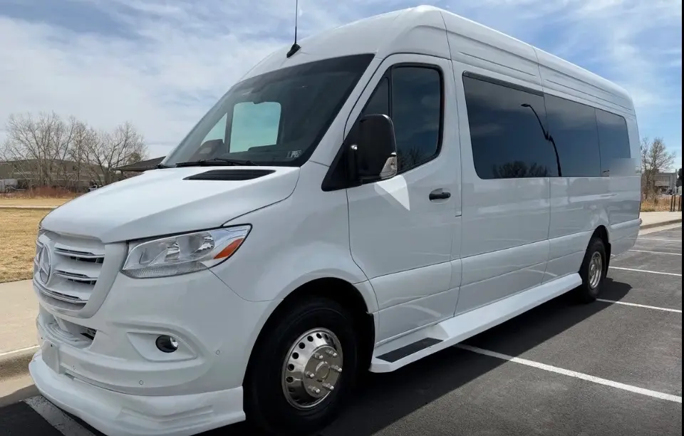 Mead 16 passenger white Sprinter limo bus